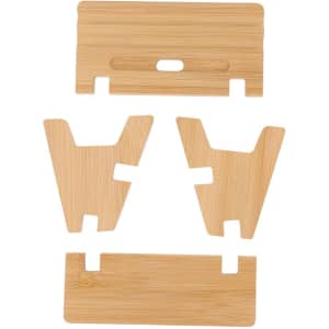 A bamboo phone stand set featuring four interlocking pieces in a natural wood finish.
