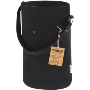 A black bag made from recycled cotton, featuring a shoulder strap and a front pocket. It has a tag attached.