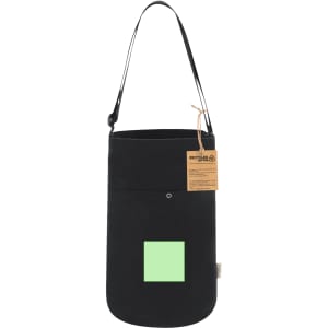 A black bag with a green square design, featuring a long strap and a tag detailing its features.