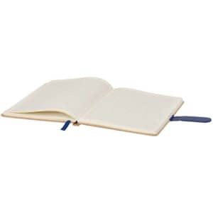 An open notepad with lined pages, featuring a cream cover and a navy blue ribbon bookmark.