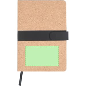 A natural cork notepad with a black band and a green stitched placeholder, featuring a ribbon bookmark.
