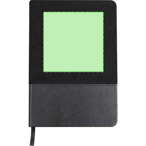 A notepad in black with a textured cover and a green accent border around an empty square area.
