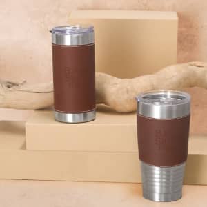 A drink bottle in brown and silver, featuring a smooth metal finish with a protective sleeve and a lid.