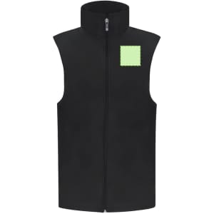A black vest features a high collar and a small green square logo on the front.