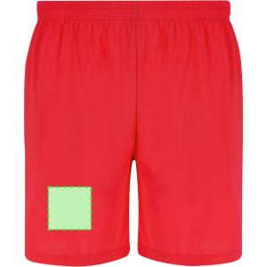 Red dress shorts with an elastic waistband and a green square patch on one leg, featuring branding.