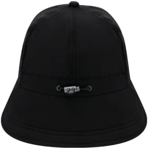 A black cap with a round crown and a wide brim, featuring a logo and a drawcord for adjustment.