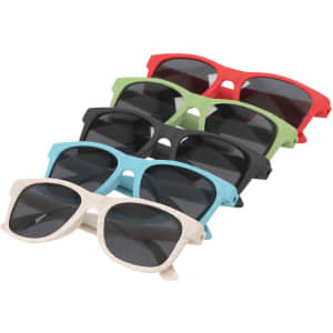A set of six colourful kids' sunglasses in red, green, blue, black, and white, featuring dark lenses and a logo.