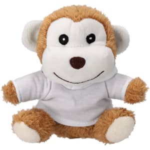 A plush toy monkey with brown and cream fur, wearing a white shirt, featuring a friendly smile and black eyes.