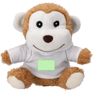 A brown and cream plush monkey toy wearing a white shirt, featuring a friendly face and a logo on the shirt.