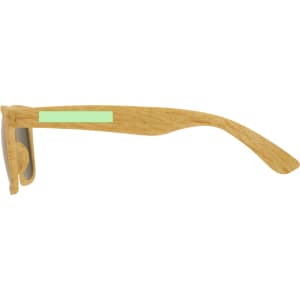 A pair of sunglasses with wooden-style frames and a mint green accent on the side.