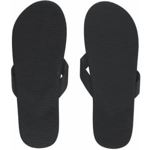 Black thongs with a textured sole and straps, featuring a simple design and no visible branding.