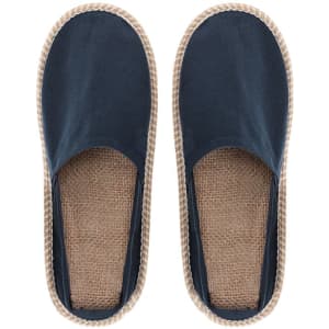 Navy espadrilles with a jute sole and a woven border, featuring a slip-on design.