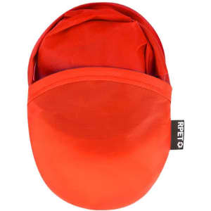 A red frisbee neatly folded into a compact pouch with a logo, designed for easy storage.