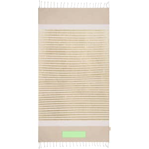 A beige bath towel with a striped design, featuring fringed edges and a logo.