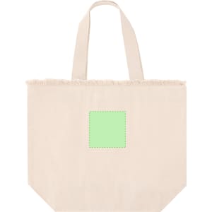 A beige tote bag with a fringe top and a square area for branding or decoration. It has two sturdy handles.