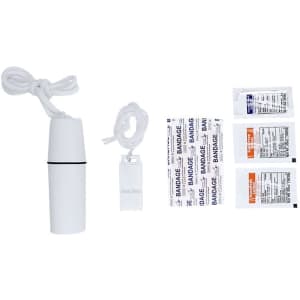 A white container with a whistle, bandages, and antiseptic wipes, arranged neatly for a hiking kit.