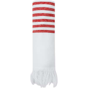 A white towel with red striped accents and fringe details, featuring a logo.
