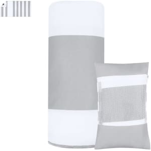 A grey and white striped towel alongside a matching storage pouch, featuring a mesh section.