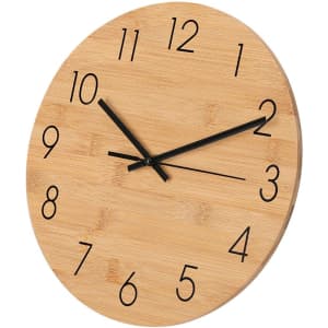 A round bamboo wall clock featuring black numerals and clock hands, showcasing a natural wood finish.