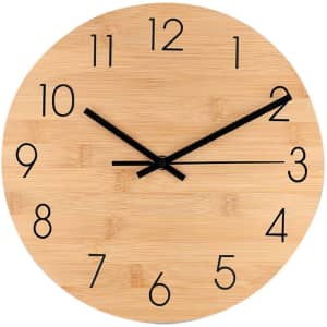 A round bamboo wall clock with black numbers and hands, featuring a natural wood finish.