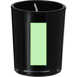 A black aromatic candle with a green label, housed in a glass container. Features a wick on top.