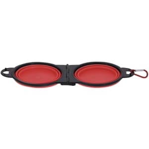 A foldable pet bowl with two compartments, featuring a black exterior and red interior. Includes a clip for easy attachment.