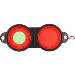 A foldable pet bowl in red and black, featuring two compartments with a clip for easy carrying.