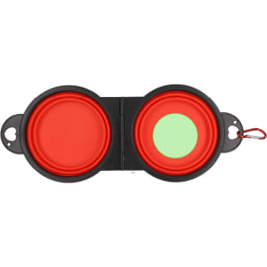 A foldable pet bowl in red and green, featuring a black exterior and a clip for easy attachment.