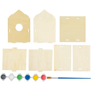 A wooden birdhouse kit featuring unassembled parts and a paint set with brush in red, blue, yellow, green, and white.