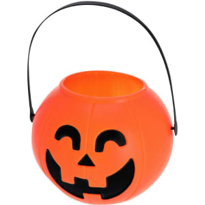 An orange Halloween basket with a smiling jack-o'-lantern face and a black handle. It has a rounded shape.