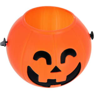 An orange pumpkin-shaped Halloween basket featuring a smiling face and black accents. It has a logo on the side.