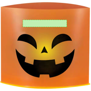 An orange candle holder featuring a black Jack-o’-lantern face and a branding logo.