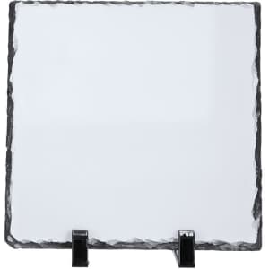 A square sublimation plaque with a textured black edge and a blank white surface, supported by black stands.