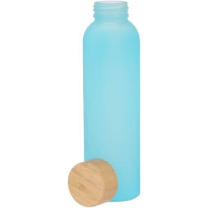 A drink bottle in a frosted light blue finish with a wooden cap placed beside it.