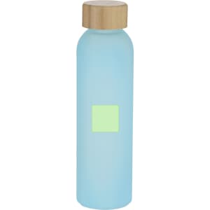 A drink bottle in a frosted light blue colour with a wooden lid and a blank section for custom branding.