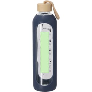 A drink bottle with a navy blue silicone sleeve, clear glass body, and a wooden lid featuring a logo.