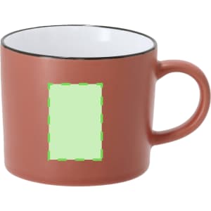 A coffee mug in a terracotta colour with a white interior and a handle, featuring an area for branding.