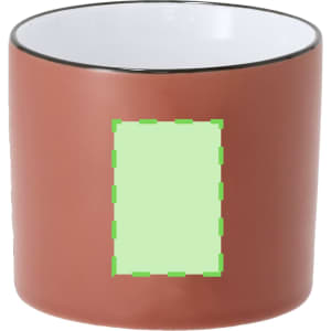 A round, terracotta-coloured mug with a white interior and a decorative black rim. It features a blank area for customisation.