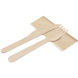 A wooden knife and fork set placed on a beige napkin. The cutlery has a natural, uncoated finish.