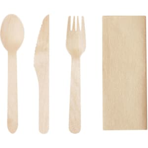A wooden cutlery set featuring a spoon, knife, fork, and a beige napkin.