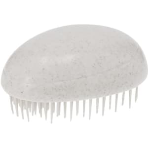 A hairbrush with a beige and white design, featuring soft bristles. It has a smooth, rounded shape and a logo.