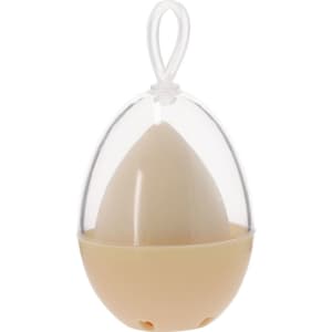 A beauty blender in a clear egg-shaped case, featuring a nude and transparent design.