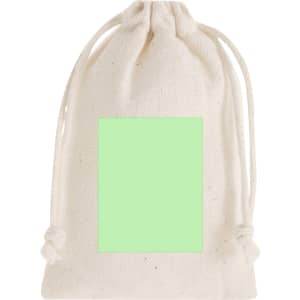 A white fabric drawstring pouch featuring a light green square in the centre. The pouch is closed by tied cords.