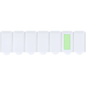 A white pillbox featuring multiple compartments, one of which has a green highlight. It includes a logo.