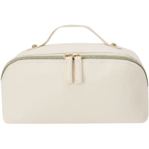 A cream toiletry bag with a zip closure and a small handle on top. It features a golden zip.