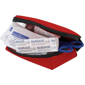 A red emergency kit containing bandages, alcohol wipes, and scissors, organised within a zippered pouch.