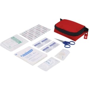 A red first aid kit containing bandages, antiseptic wipes, scissors, and various medical supplies.