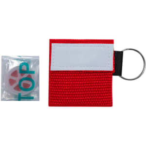 A red keychain CPR mask holder with a keyring and a small sealed packet containing a mask.