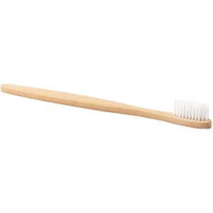 A bamboo toothbrush with a natural wood handle and soft white bristles, featuring a simple design.