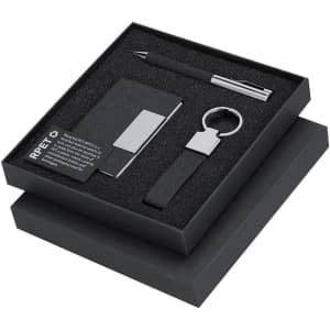 A sleek black gift set including a drink bottle, pen, keyring, and cardholder, presented in a stylish box.